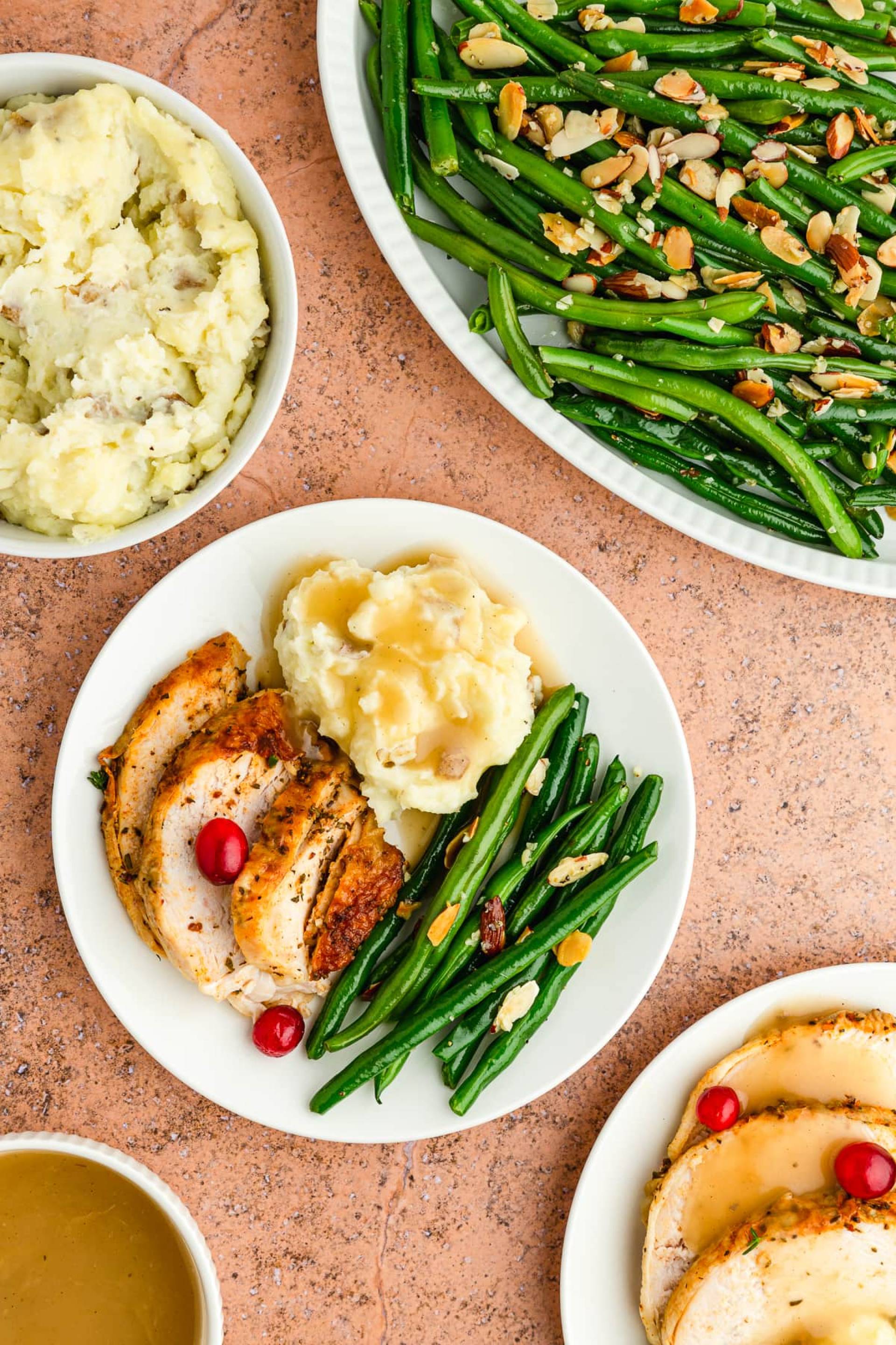 Pan Seared Meati Cutlets with Green Bean Almondine, Sage Gravy and Mashed Potatoes