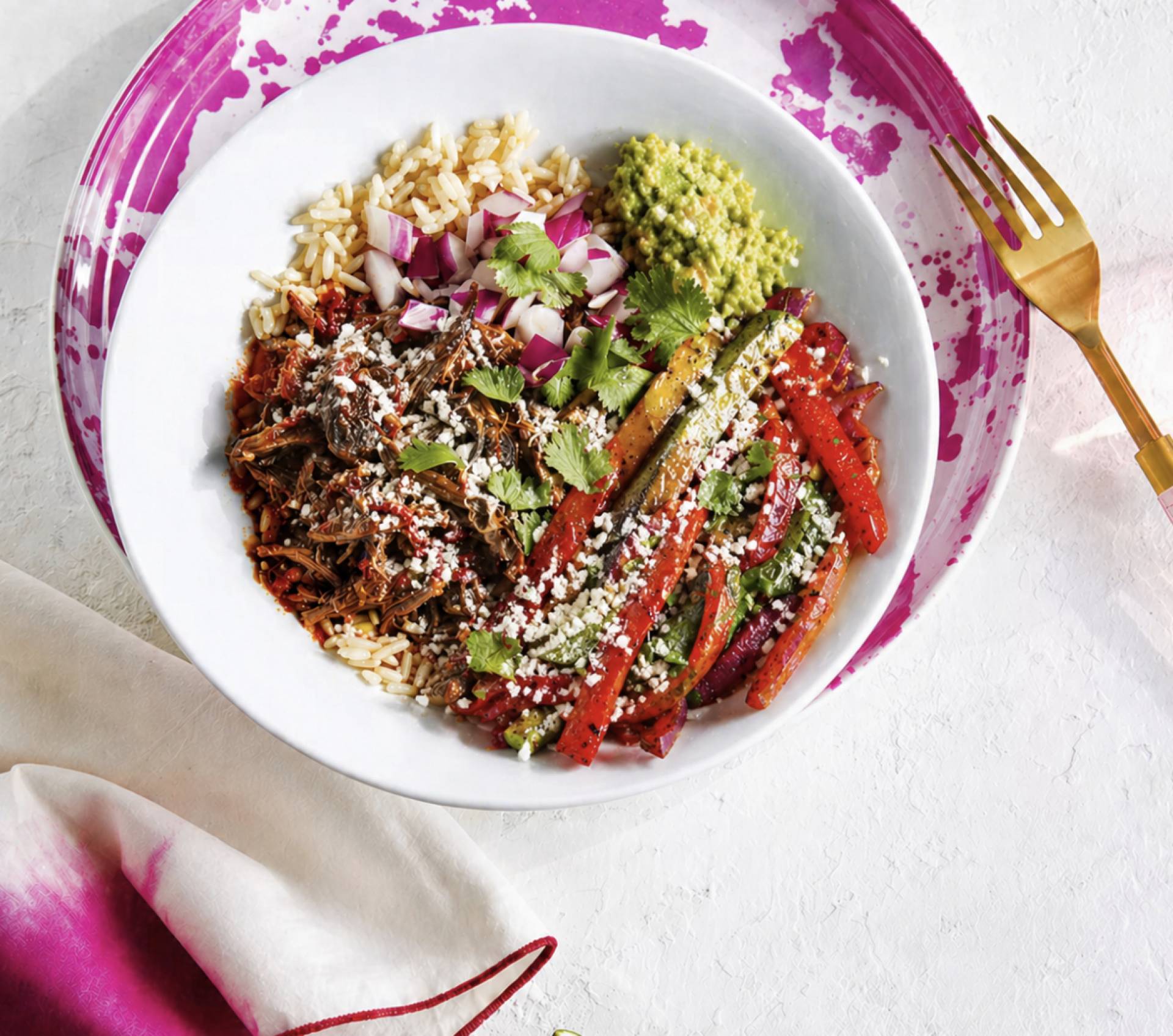 Braised Beef Birria Burrito Bowls with Guacamole