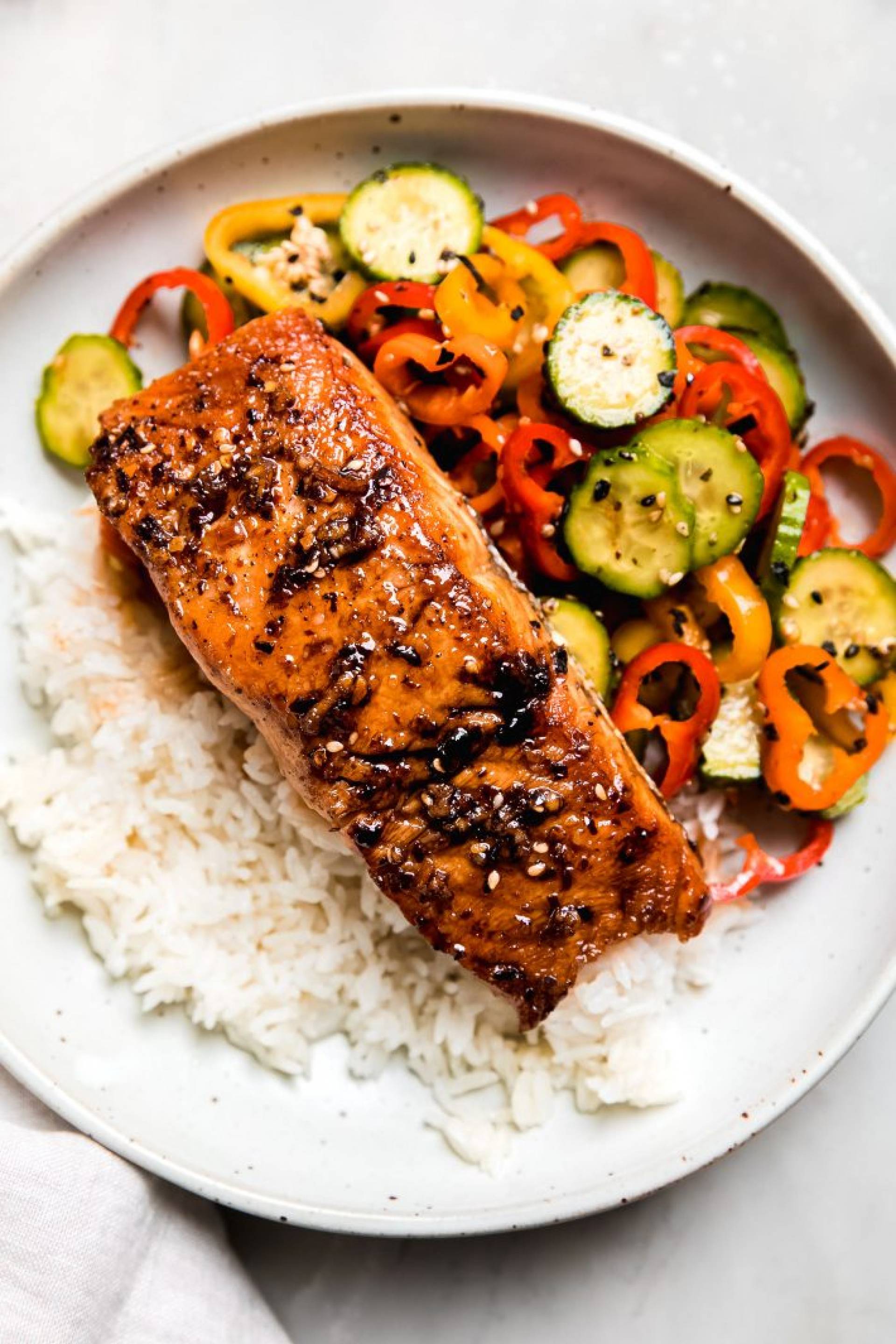 Chili Crunch Salmon with Cucumber and Sweet Pepper Salad