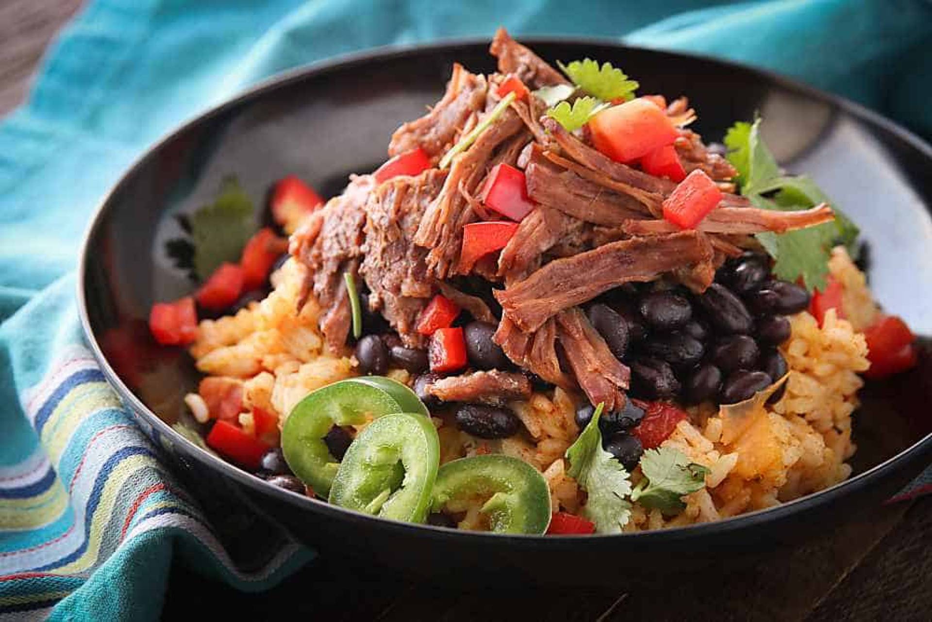 Braised Beef Barbacoa with Calabacitas and Mexican Rice