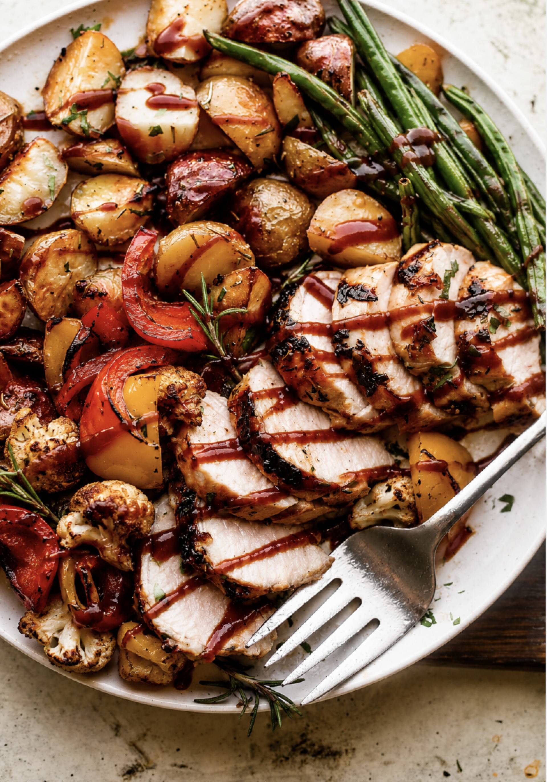 Hickory Rubbed BBQ Pork Tenderloin with Garlic Potatoes and Rosemary Vegetables