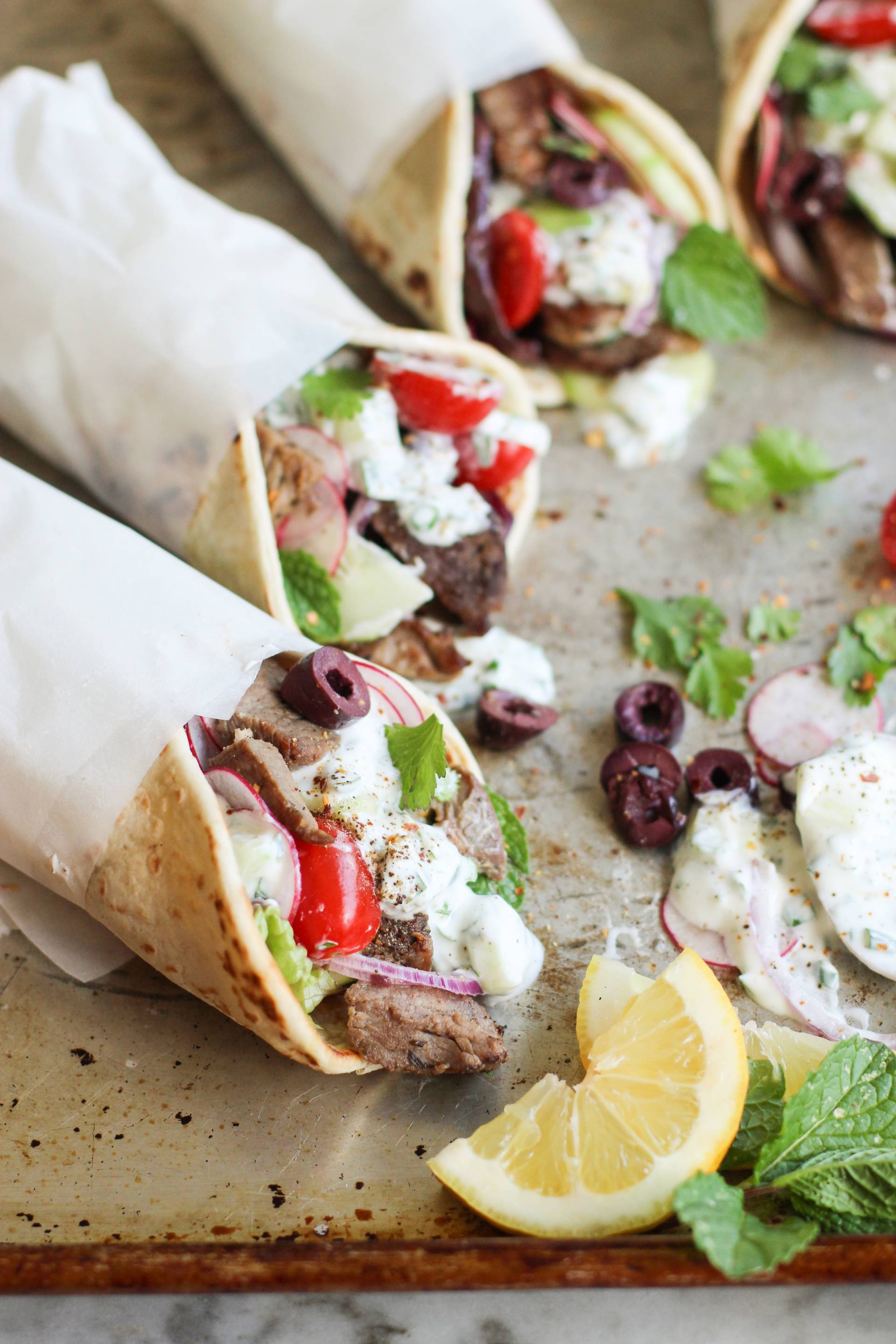 Gluten and Dairy Free Roasted Lamb Gyro Bowl with Harissa Hummus