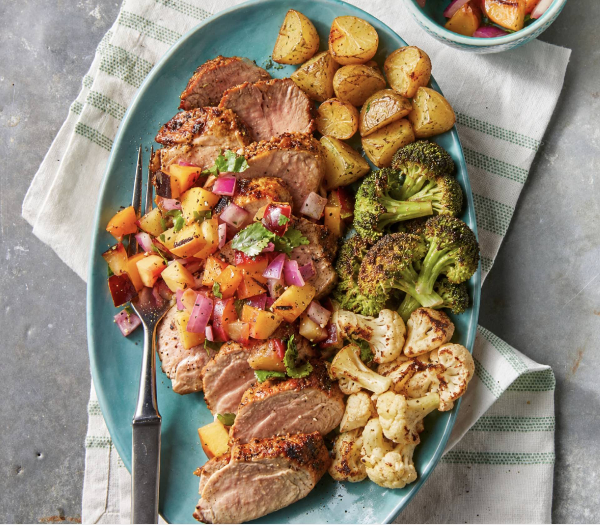Grilled Pork Tenderloin with Palisade Peaches and Spiced Yukons