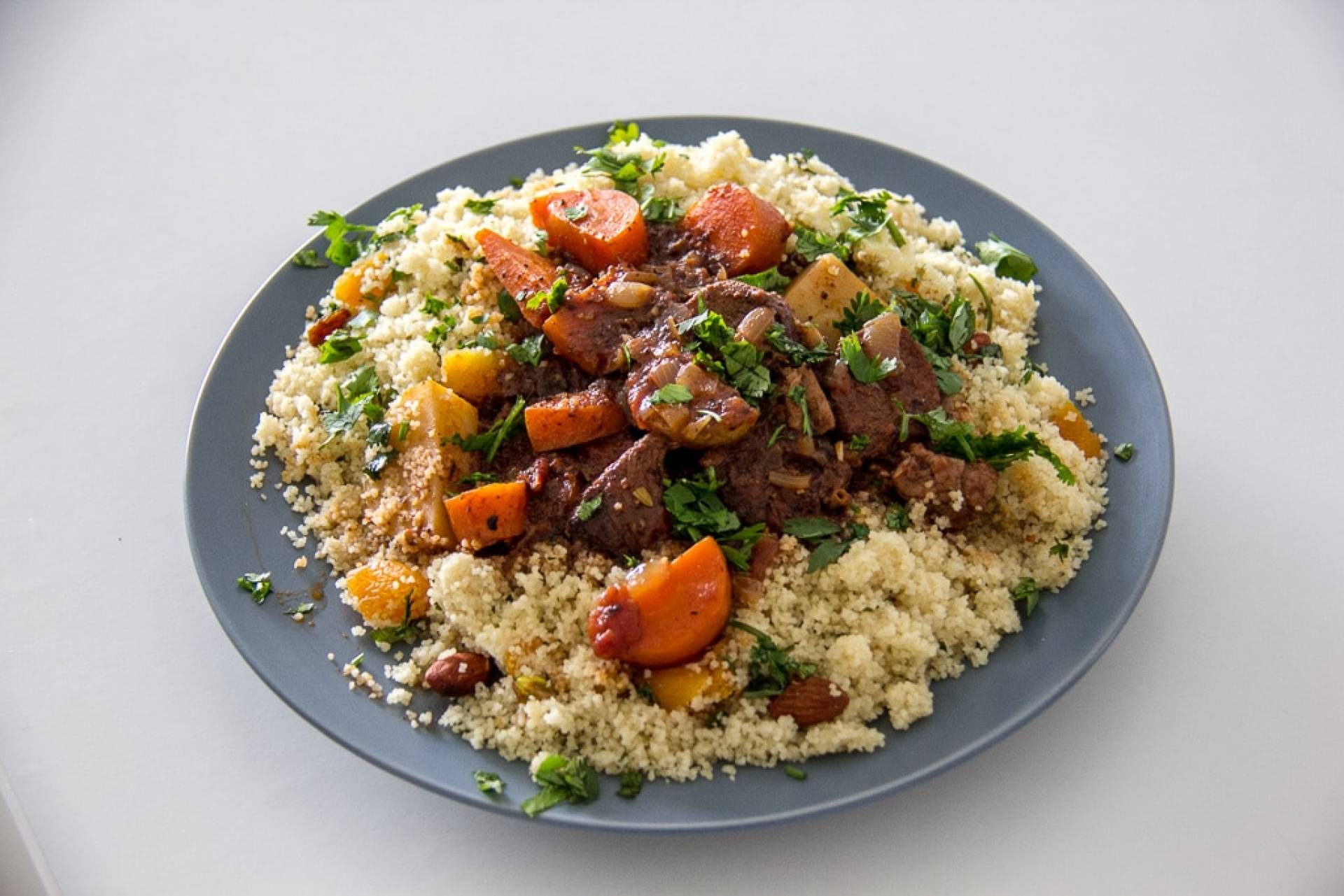 Moroccan Lamb Tagine with Couscous and Harissa Carrots