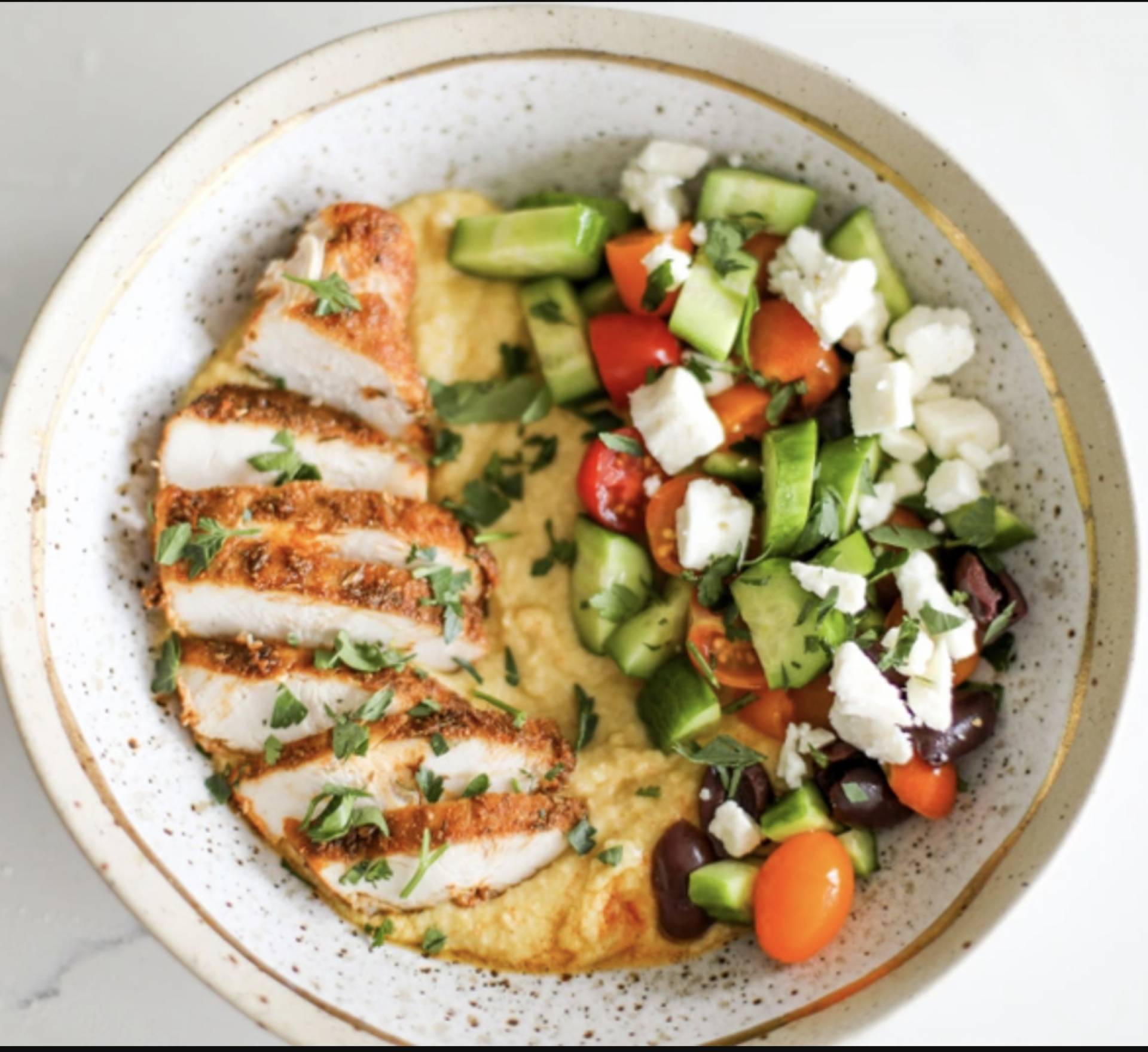 Greek Chicken Thighs with Lemon Oregano Potatoes and Cucumber Salad