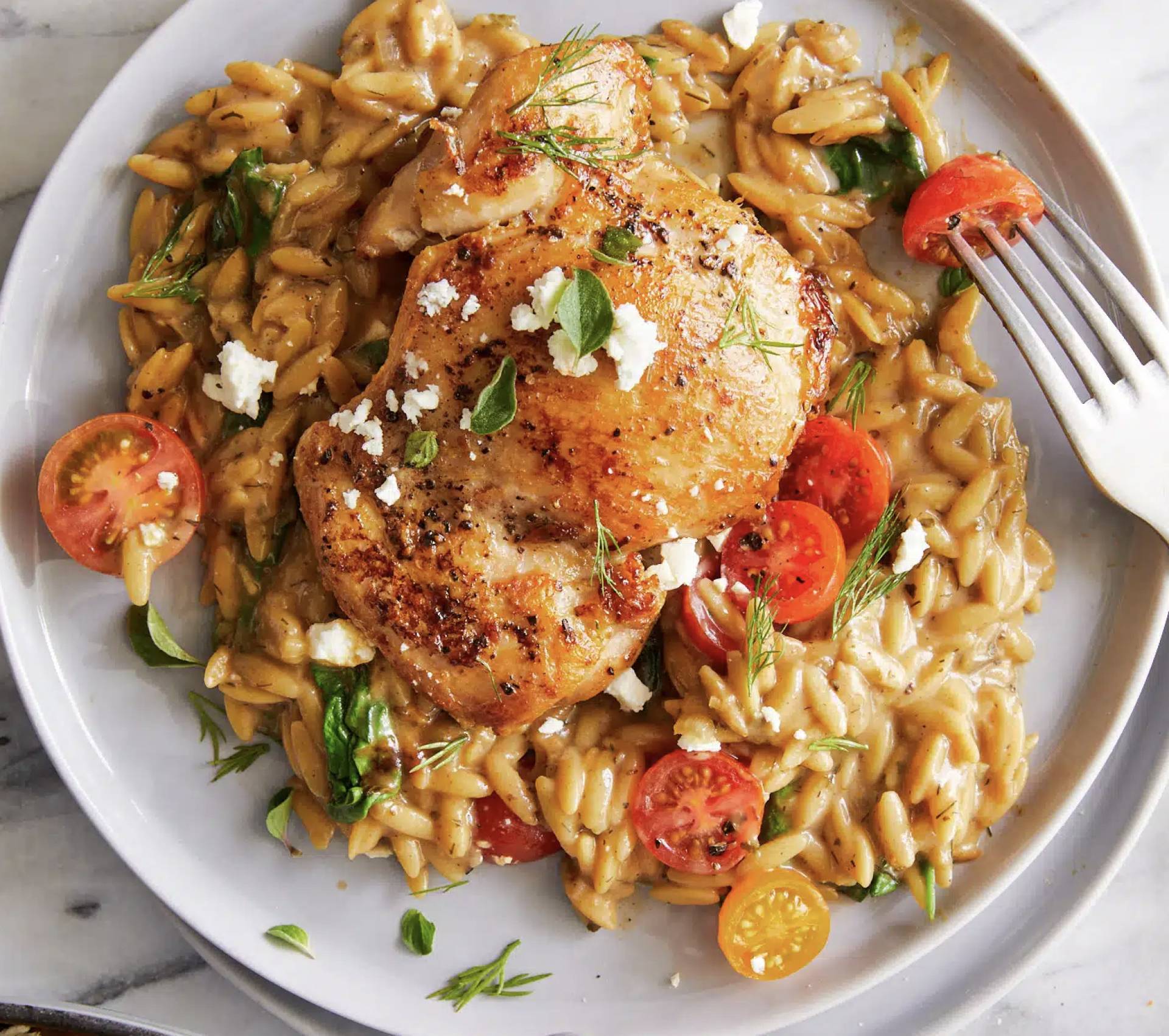 Low Carb Greek Chicken Thighs with Lemony Cauliflower Rice and Cucumber Salad